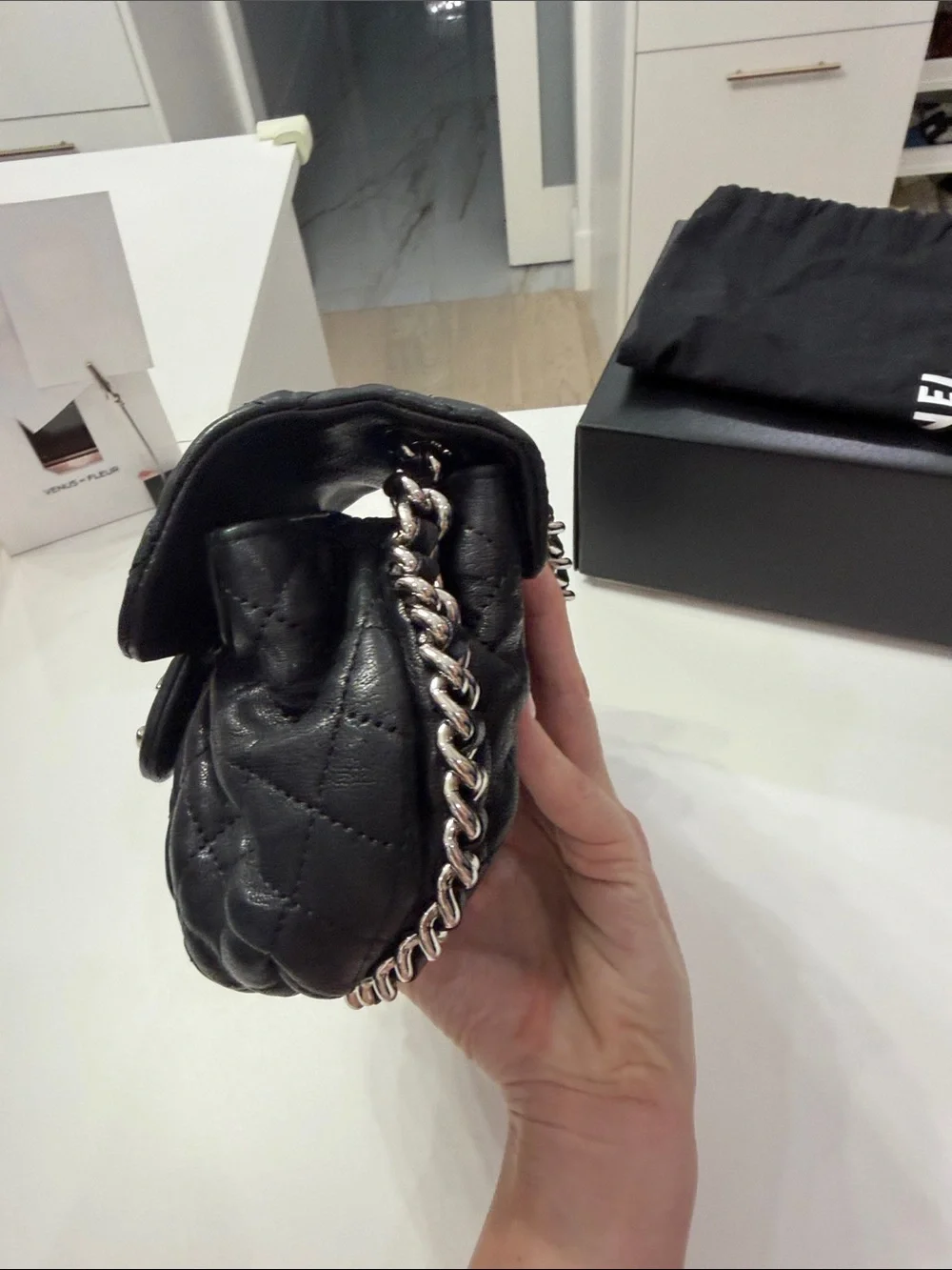 CHANEL Black Quilted leather chain around Crossbody with Silver CC Chain